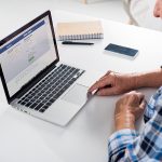 man visiting Facebook
